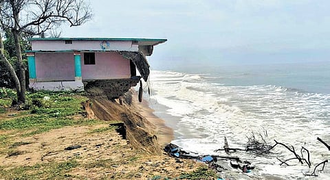 The remains of the concrete house swept away by the sea in Podampeta village