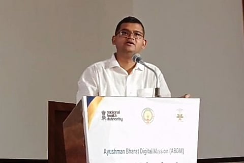 District Collector Swapnil Dinkar Pundkar speaking at the Ayushman Bharat Digital Mission (ABDM) Model District & Model Facilities program in Srikakulam district on Friday.