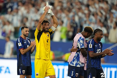 Cape Verde goalkeeper Vozinha (1) applauds the crowd as he leaves after the World Cup round of 32 soccer match between Argentina and Cape Verde in Miami Gardens, Fla., Friday, July 3, 2026.