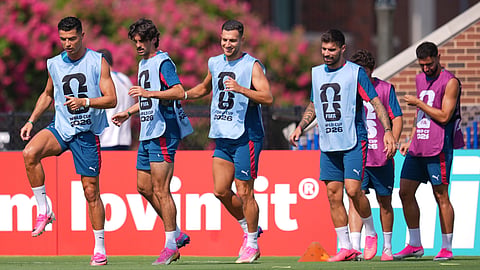 Portugal's Cristiano Ronaldo, left, leads teammates on a drill during a training session ahead of his team's World Cup round of 16 soccer match against Spain, Sunday, July 5, 2026, in Dallas.