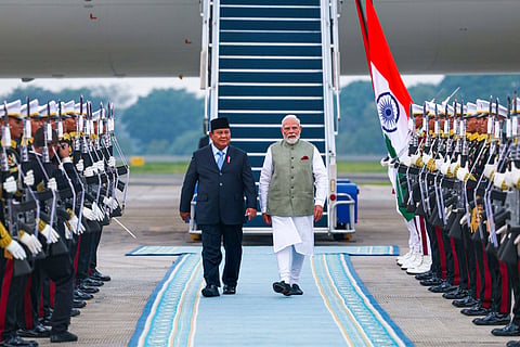 Prime Minister Narendra Modi being welcomed by Indonesia's President Prabowo Subianto on his arrival in Jakarta, Indonesia.