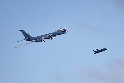 Royal Navy F-35B fighter, right, of UK Carrier Strike Group launches from HMS Prince of Wales to intercept a Russian military aircraft, Thursday July 2, 2026.