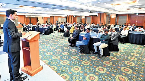 IT Minister Nara Lokesh addressing the Telugu diaspora meeting in Seoul.