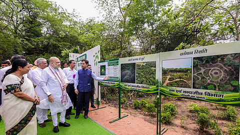 Union Home Minister Amit Shah along with Delhi Chief Minister Rekha Gupta during a tree plantation drive carried out in the President's Bodyguard premises, in New Delhi.