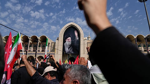 Mourners attend the start of the dayslong funeral ceremonies for the late Iranian Supreme Leader Ayatollah Ali Khamenei and members of his family at the Imam Khomeini Mosalla Grand Mosque in Tehran, Iran, Saturday, July 4