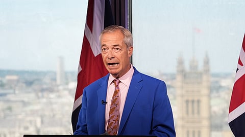 Reform UK leader Nigel Farage makes a statement to the media at the party headquarters in Millbank, central London, Tuesday, July 7, 2026.