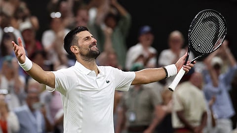 Serbia's Novak Djokovic celebrates beating Canada's Felix Auger-Aliassime during their men's singles quarter-final tennis match at the 2026 Wimbledon Championships on July 7, 2026.