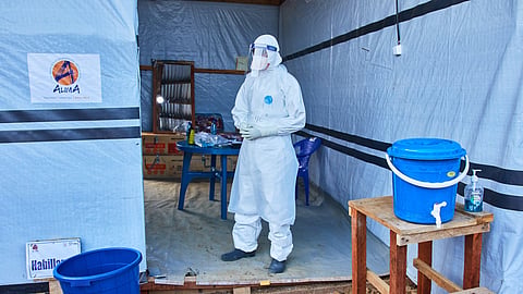 A health worker stands at the Evangelical Medical Center, in Bunia, eastern Congo, Friday, July 3, 2026, where Ebola clinical trials are scheduled to take place.