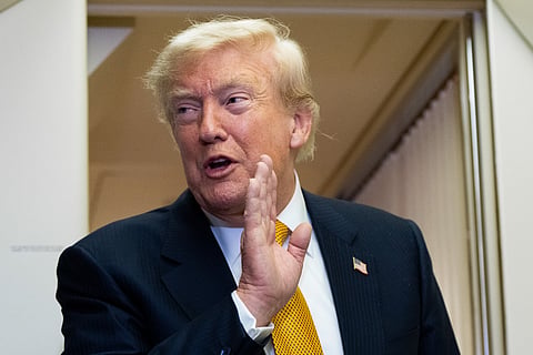 President Donald Trump speaks with reporters in flight on Air Force One after landing at U.S. Air Force Base at RAF Mildenhall, in Suffolk, Eastern England, Wednesday, July 8, 2026.