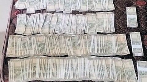 Cash seized from the mining officer.
