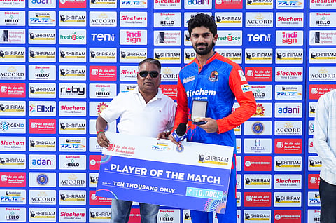 Aman Khan with the player of the match award