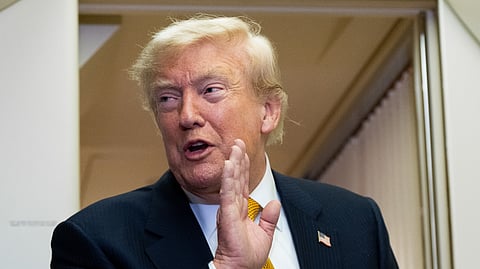 President Donald Trump speaks with reporters in flight on Air Force One after landing at U.S. Air Force Base at RAF Mildenhall, in Suffolk, Eastern England, Wednesday, July 8, 2026.