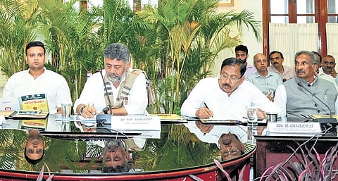 CM DK Shivakumar chairs a high-power committee meeting on Dasara festivities in Bengaluru on Friday. Mysuru-Kodagu MP Yaduveer Krishnadatta Chamaraja Wadiyar, Deputy CM Dr G Parameshwara and Energy Minister KJ George look on.