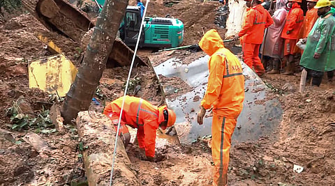 Officials carry out a search and rescue operation at the site of a massive landslide that struck the under-construction twin tunnel project at Kalladi near Meppadi, in Wayanad district, Kerala, Wednesday, July 8, 2026.