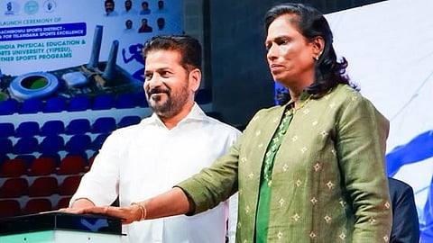 Chief Minister Revanth Reddy along with PT Usha, President of the Indian Olympic Association and Rajya Sabha Member, unveil the logo and website of the Young India Physical Education and Sports University.
