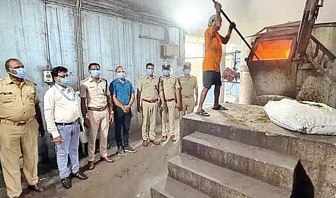 Ganja and other narcotics being incinerated in the presence of police.