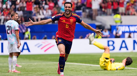 Spain's Mikel Merino (6) celebrates scoring their second goal in front of Belgium's Timothy Castagne (21) and goalkeeper Senne Lammens (12) during the World Cup quarterfinal soccer match between Spain and Belgium on July 10, 2026.