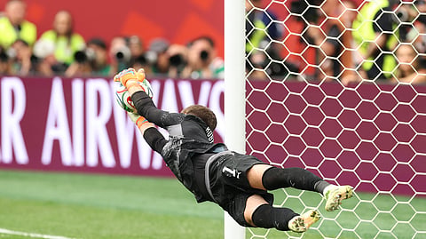 Gregor Kobel of Switzerland saves the Colombia's penalty taken by Cucho Hernandez in a penalty shootout during the FIFA