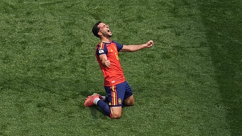 Spain's Mikel Merino (6) celebrates scoring their second goal during the World Cup quarterfinal soccer match between Spain and Belgium in Inglewood, Calif., near Los Angeles, Friday, July 10, 2026.
