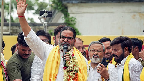 Jan Suraaj Party founder Prashant Kishor addresses supporters during a nomination meeting for the Bankipur Assembly by-election at the Scout Guide Ground in Patna on Monday, July 13, 2026.