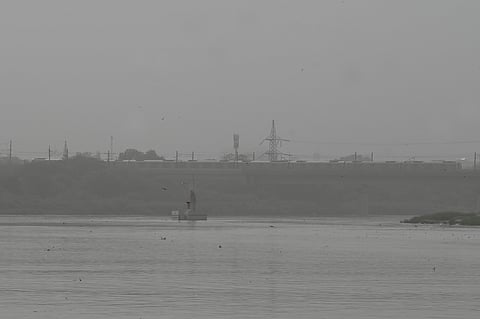 A hazy view of the Yamuna on a summer day, in New Delhi, Sunday, July 12, 2026, capitals AQI 400 Air Quality is Hazardous.