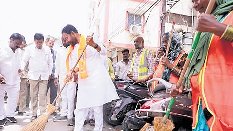 Union Minister G Kishan Reddy takes part in Swachhata Abhiyaan during a BJP padayatra in Amberpet on Sunday