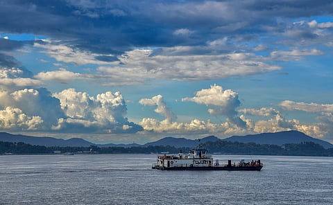 A passenger ferry crosses the Brahmaputra river as the water level rises amid ongoing monsoon rains in the catchment areas, in Guwahati, Assam, Monday, July 6, 2026.
