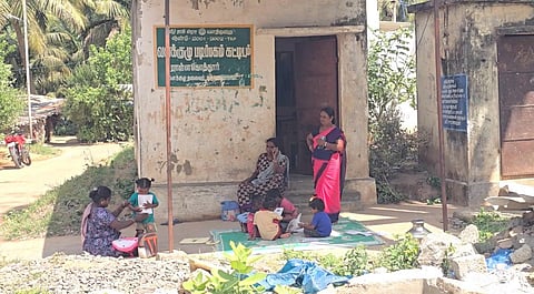 Anganwadi children forced to sit outside unfinished building in Tirupattur village.
