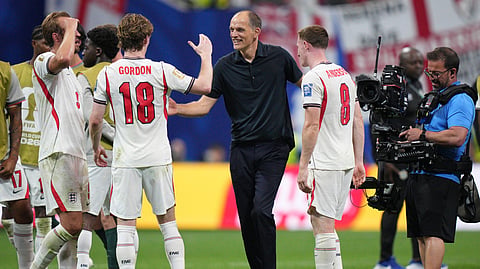 ngland head coach Thomas Tuchel celebrates with his players after the World Cup round of 32 soccer match between England and Congo in Atlanta, Wednesday, July 1, 2026.