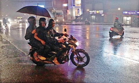 Bikers rush back home as heavy rain lashes Bhubaneswar on Wednesday