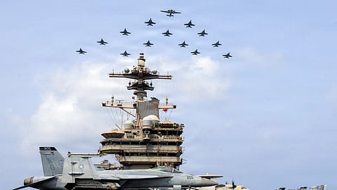 This US Navy handout photo, released on July 15, 2026, shows the Carrier Air Wing (CVW) 7 flying in formation over the USS George HW Bush (CVN 77) in the Arabian Sea.