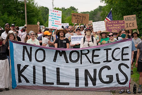 Protesters gather near a U.S. Immigration and Customs Enforcement facility Scarborough, Maine, one day after the shooting of Johan Sebastián Durán Guerrero, Tuesday, July 14, 2026.