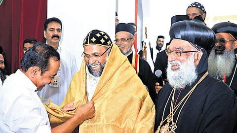 Chief Minister V D Satheesan greets Kuriakose Mor Theophilose, the new metropolitan of the Thiruvananthapuram region of the Jacobite Church, at
St Peter’s Jacobite Syrian Cathedral on Wednesday.