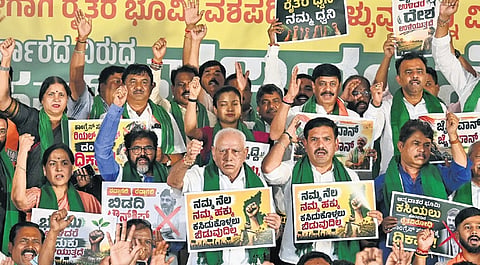 BJP leaders, including former chief minister BS Yediyurappa, state party president
BY Vijayendra, LoP R Ashoka and others protest against the Bidadi Township plan at Freedom Park in Bengaluru on Friday.