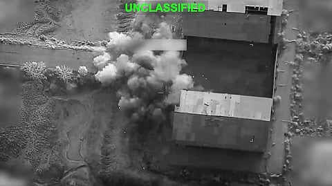 This screen grab made on July 15, 2026, from a handout video released by US Central Command on July 13, 2026, shows what the US military says is a strike in Iran.