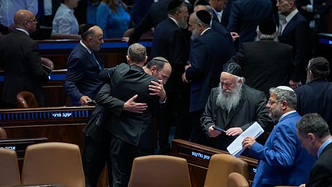 Israeli lawmakers attend a parliamentary session in Jerusalem for a vote on a bill that would change the authority and responsibilities of the attorney general Wednesday, July 15, 2026, in Jerusalem.