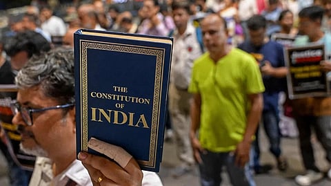 We are about to spend a session, a constitutional amendment and God knows how many broken parties—over the meaning of a single word
