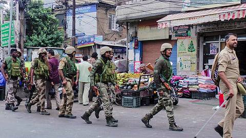 Security personnel route march