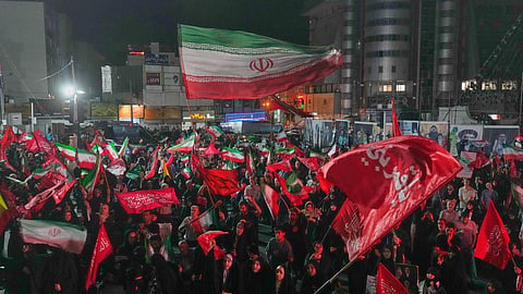 Pro-government demonstrators gather at a square in Tehran, Friday, July 17, 2026.