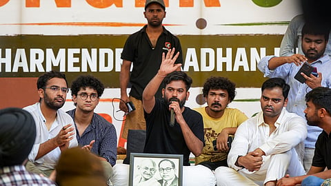 Cockroach Janata Party (CJP) founder Abhijeet Dipke begins an indefinite hunger strike at Jantar Mantar after activist Sonam Wangchuk, unseen, who has been on an indefinite hunger strike for 21 days, was shifted to a hospital for medical care in New Delhi on Saturday, July 18, 2026.
