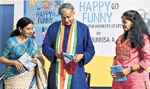 Congress MP Shashi Tharoor releasing ‘Happy Go Funny,’ authored by Khyrunnisa A, at the Christ Centenary Memorial Hall in Thiruvananthapuram on Saturday. Khyrunnisa and Anupama Varma are also seen .