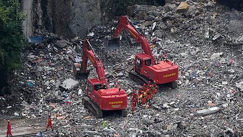 Rescuers work at the site of a landslide in Pengshui County in southwestern China's Chongqing on Sunday, July 19, 2026.