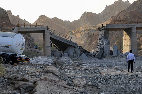 A heavily-damaged bridge which was hit by a US strike is pictured along the road connecting Roudan and Bandar Abbas in southern Iran on July 18, 2026.