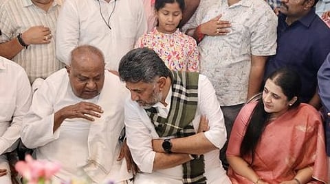 Chief Minister DK Shivakumar consoles HD Deve Gowda after the death of Chennamma on Saturday.