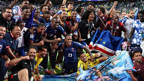 Cape Verde team members celebrate after a World Cup game.