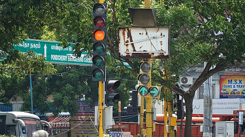 Motorists were left confused as a non-functional traffic signal remained positioned in front of an active one, partially blocking visibility and creating uncertainty for road users at Rajiv Gandhi Square in Puducherry.