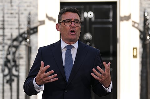 Britain's new Prime Minister Andy Burnham speaks to staff and media at 10 Downing Street in London, Monday, July 20, 2026