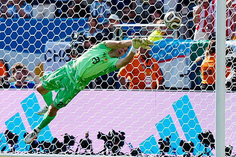 Argentina goalkeeper Emiliano Martinez makes a save against Spain during the second half of the World Cup final soccer match between Spain and Argentina in East Rutherford, N.J., Sunday, July 19, 2026.