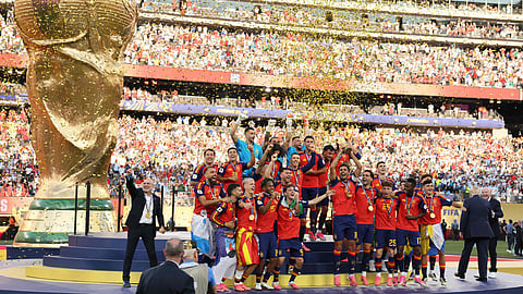Spain's captain Rodri lifts the trophy with his teammates after winning the 2026 World Cup football tournament final match between Spain and Argentina