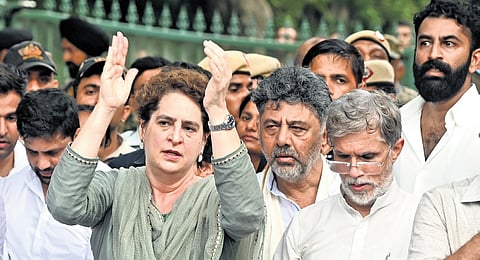 Congress MP Priyanka Gandhi, Karnataka Chief Minister DK Shivakumar and
others protest near the PM’s residence in New Delhi on Tuesday.